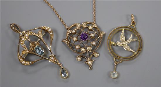 Three assorted Edwardian 9ct and gem set pendants, pendant brooches including one with 9ct chain.